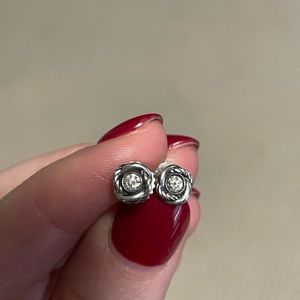 David Yurman Crossover Infinity Stud Earrings in Sterling Silver with diamonds.